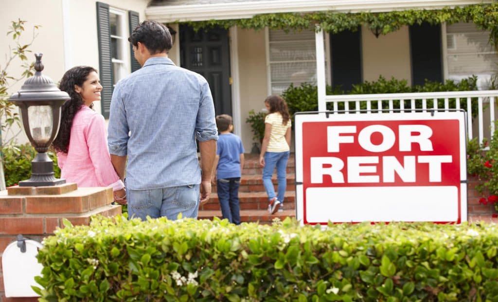Landlord inspecting a residential rental property before a tenant moves in