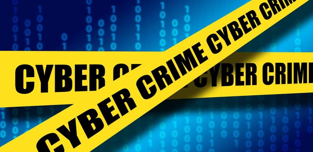 Business computer displaying a cybersecurity warning after a data breach